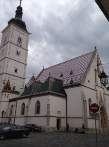 A church with a beautiful roof.